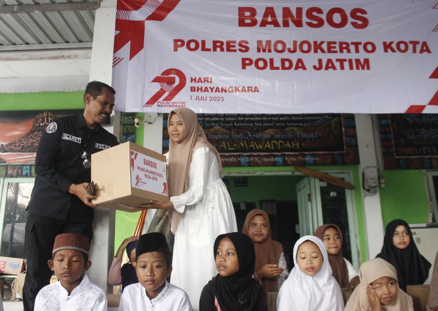 HUT Bhayangkara, Polres Mojokerto Kota Berbagi ke Panti Asuhan Kota Mojokerto.